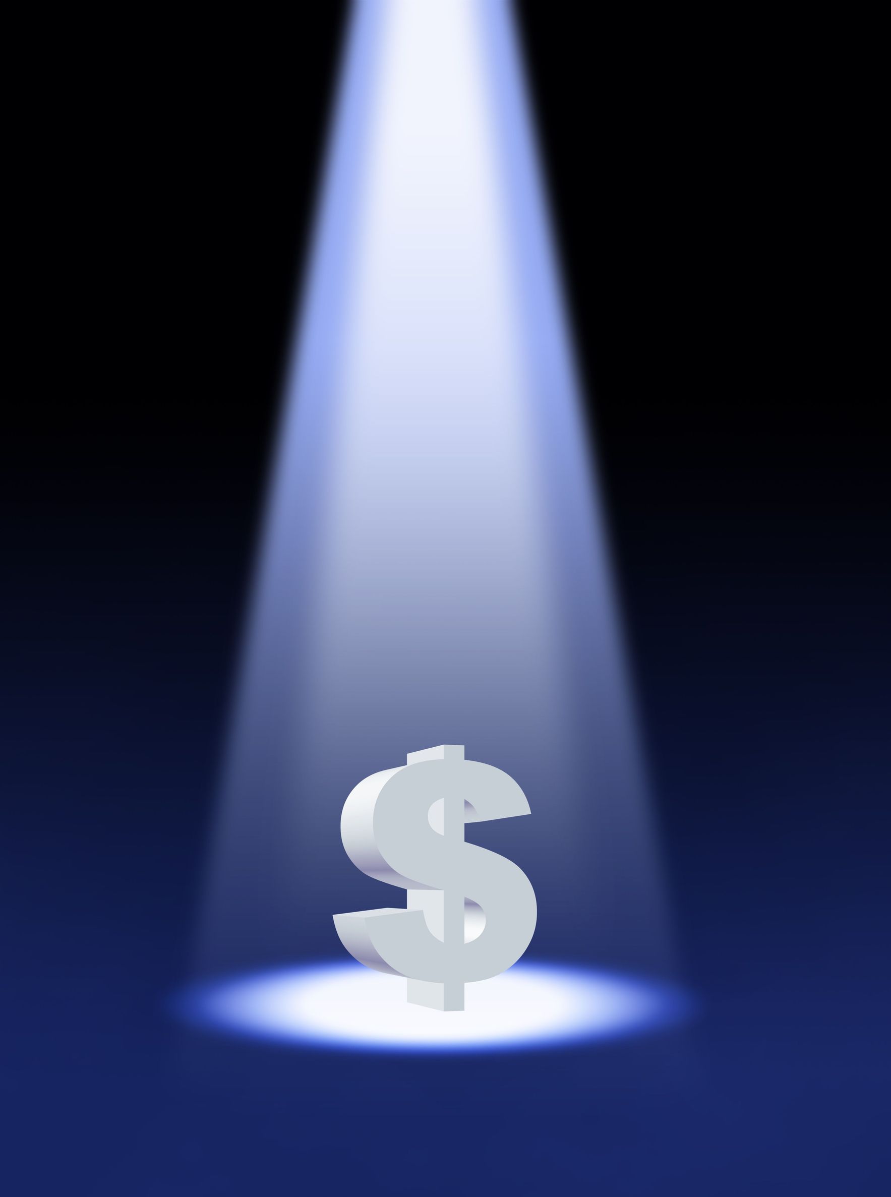 A dollar sign in the spotlight, just like health insurance premium changes are highlighted each April